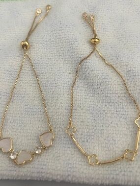 Beautiful ladies gold tone adjustable bracelets